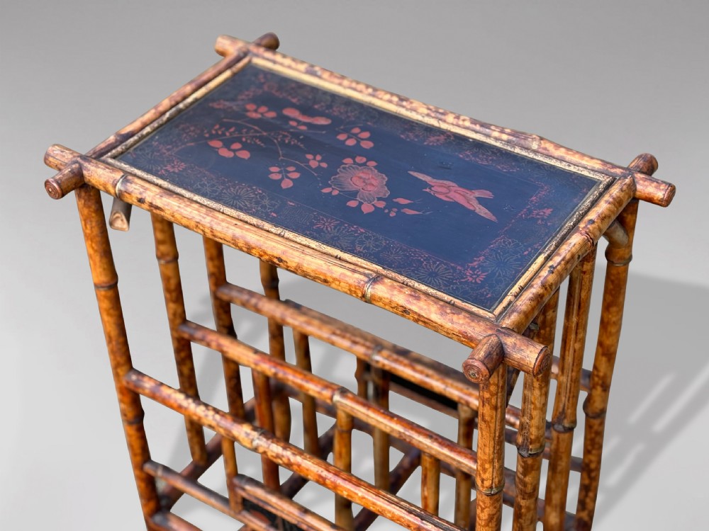 A late 19th-century tiger bamboo side table with a hand-painted lacquered top and integrated lower magazine rack dividers. View IV