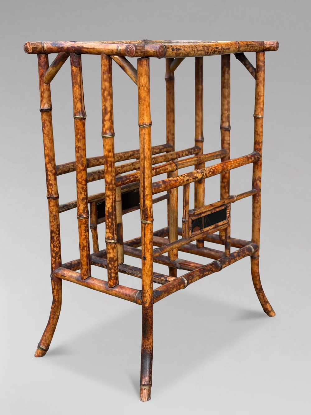 A late 19th-century tiger bamboo side table with a hand-painted lacquered top and integrated lower magazine rack dividers. View VI