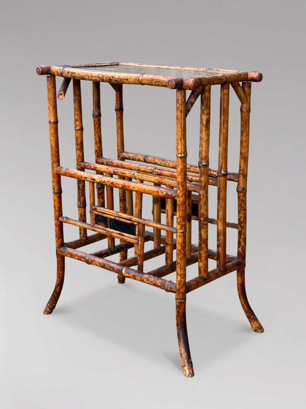 A late 19th-century tiger bamboo side table with a hand-painted lacquered top and integrated lower magazine rack dividers. View VII