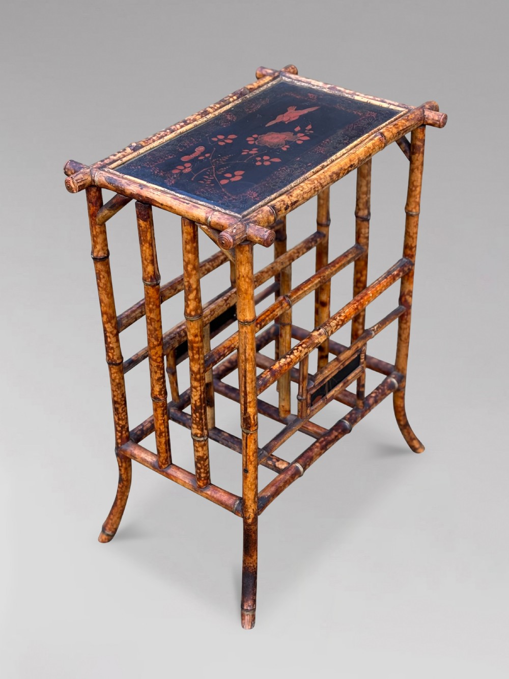 A late 19th-century tiger bamboo side table with a hand-painted lacquered top and integrated lower magazine rack dividers. View VIII