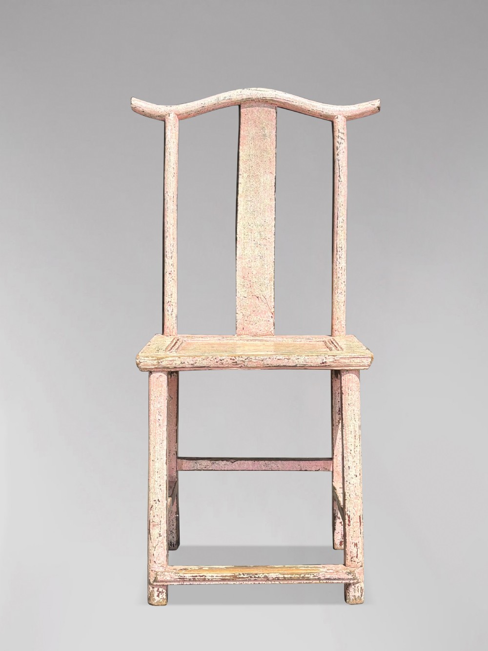 A pair of 19th-century Chinese yoke-back side chairs featuring a distressed pale pink painted finish, curved top rails, and central vertical back splats. View IV