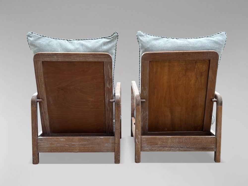 PAIR OF RECLINING ARMCHAIRS IN THE MANNER OF LIBERTY & CO View X