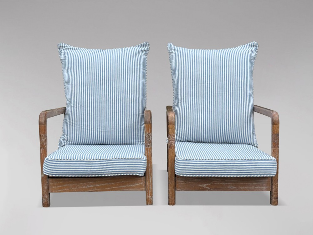 PAIR OF RECLINING ARMCHAIRS IN THE MANNER OF LIBERTY & CO View XII