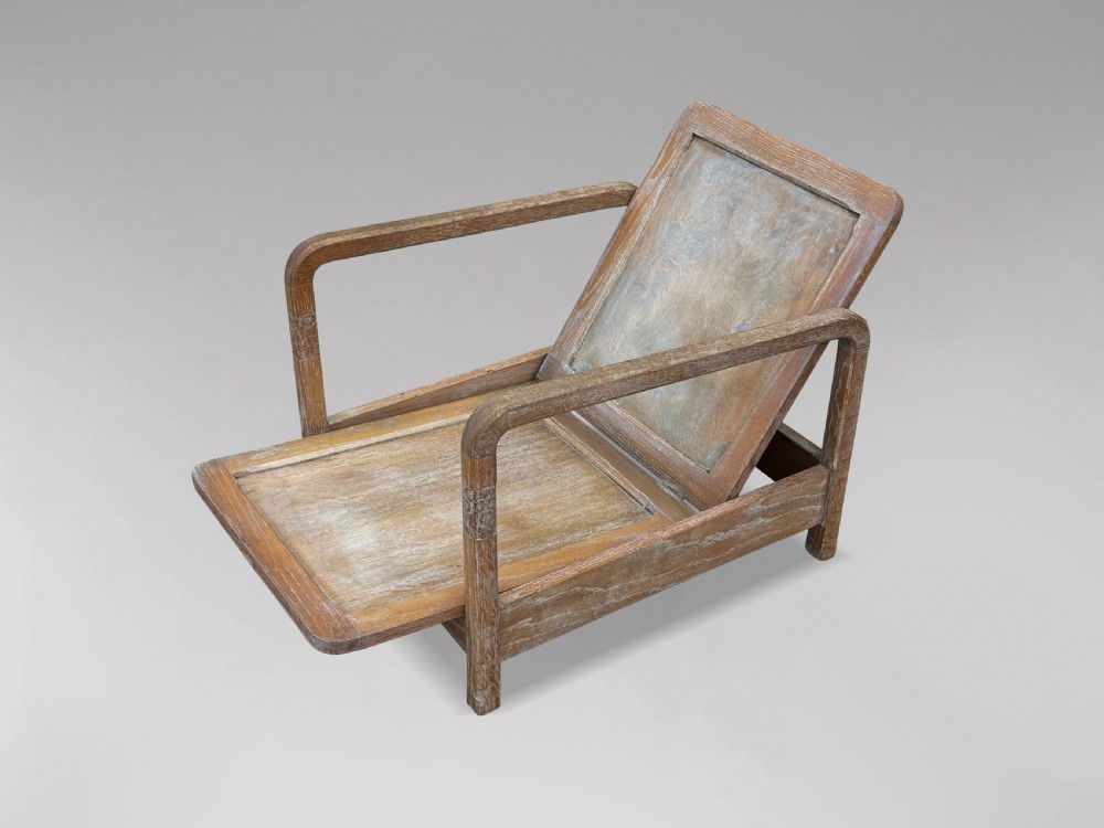 PAIR OF RECLINING ARMCHAIRS IN THE MANNER OF LIBERTY & CO View XIV