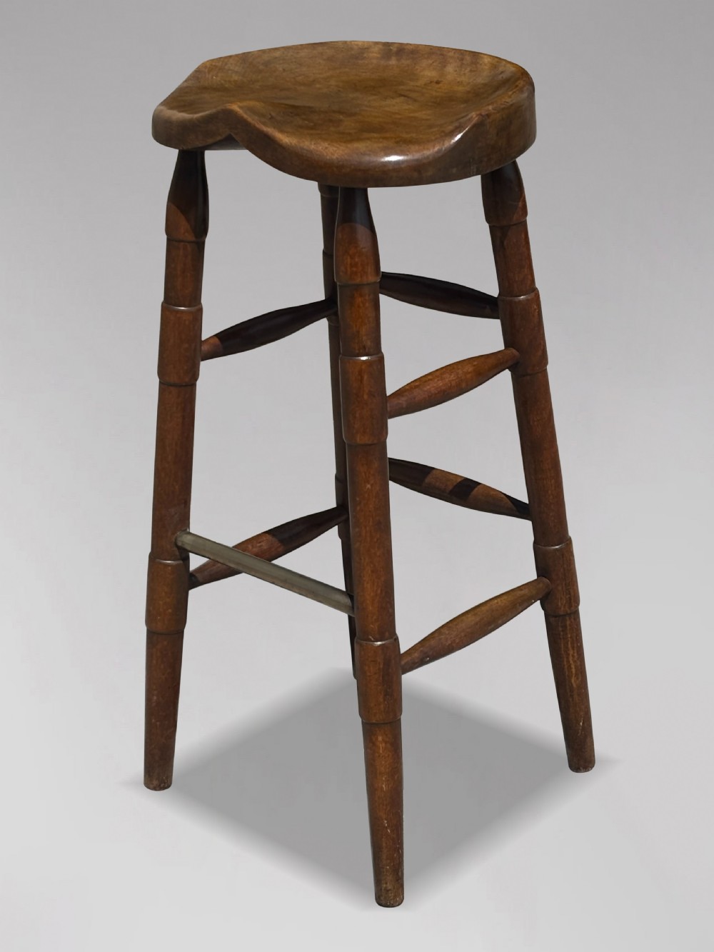 19TH CENTURY ELM ARTIST'S OR BAR SADDLE SEAT STOOL, C1890
