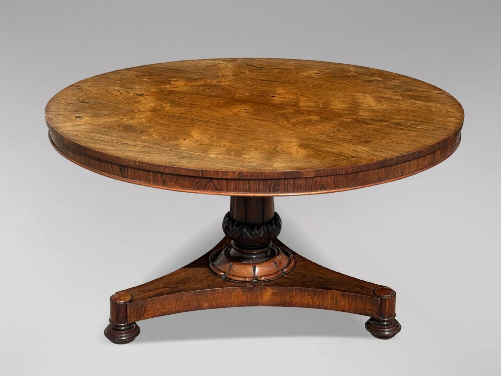 An early 19th-century William IV circular tilt-top centre table constructed from figured rosewood with a triform base. View III