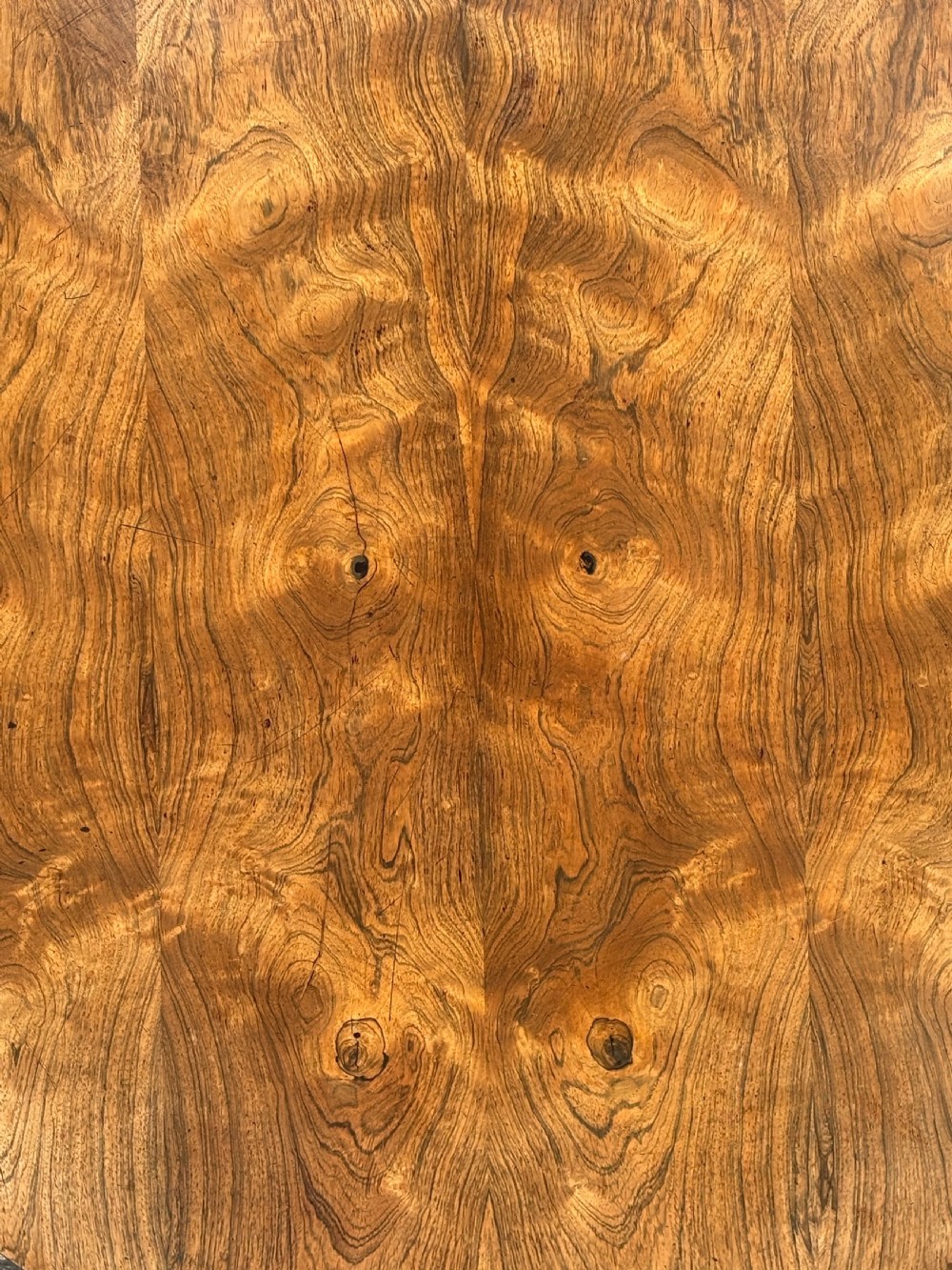 An early 19th-century William IV circular tilt-top centre table constructed from figured rosewood with a triform base. View V