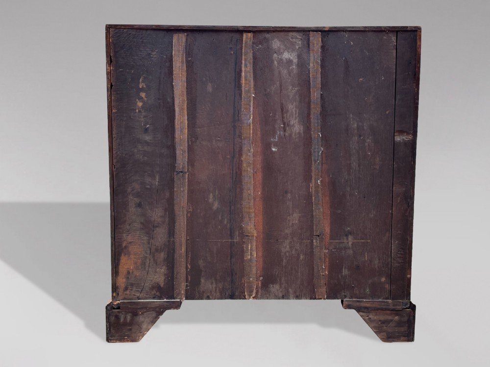 An 18th-century George III mahogany bureau featuring a sloping fall-front writing flap above four graduated drawers with brass handles and bracket feet. View IX