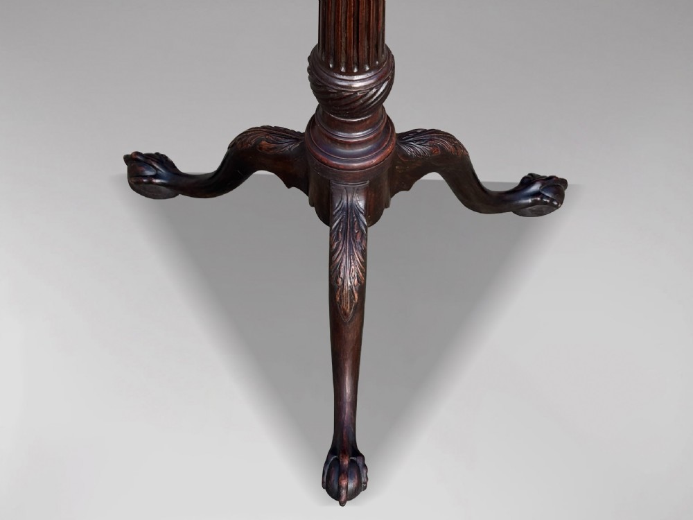 An 18th-century George III mahogany tilt-top tripod table featuring a carved piecrust rim, a fluted column, and cabriole legs ending in claw and ball feet. View VIII