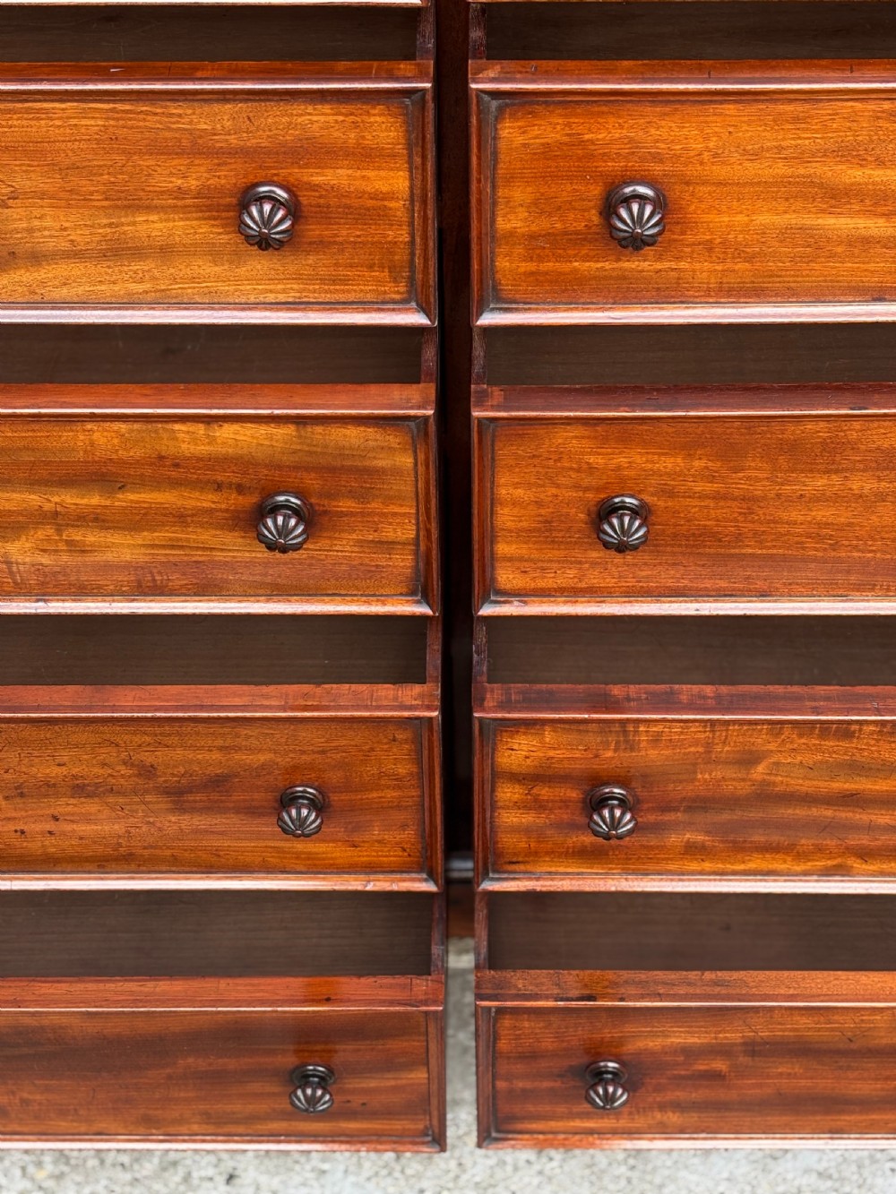 A nineteenth-century mahogany open library bookcase featuring a Wellington chest base with ten small drawers and open adjustable upper shelves. View XIV