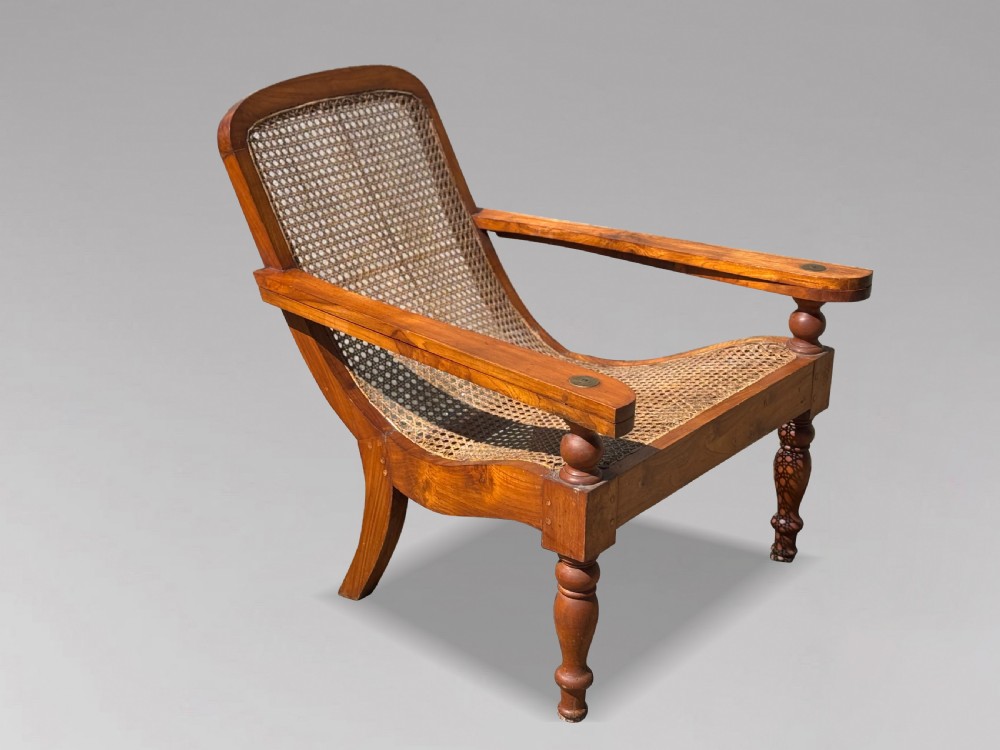 PAIR OF 20TH CENTURY LARGE TEAK & CANE COLONIAL PLANTERS CHAIRS View III