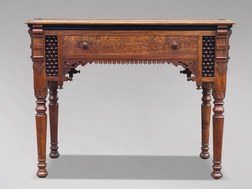 A late 19th-century Aesthetic Movement side table featuring carved wood, a central mother-of-pearl inlay medallion, turned spindle side panels, and turned legs. View III