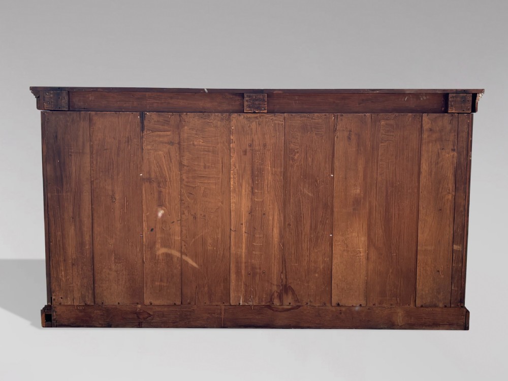A low 19th-century William IV open bookcase crafted from burr walnut with two shelf sections flanked by carved pilasters. View VII