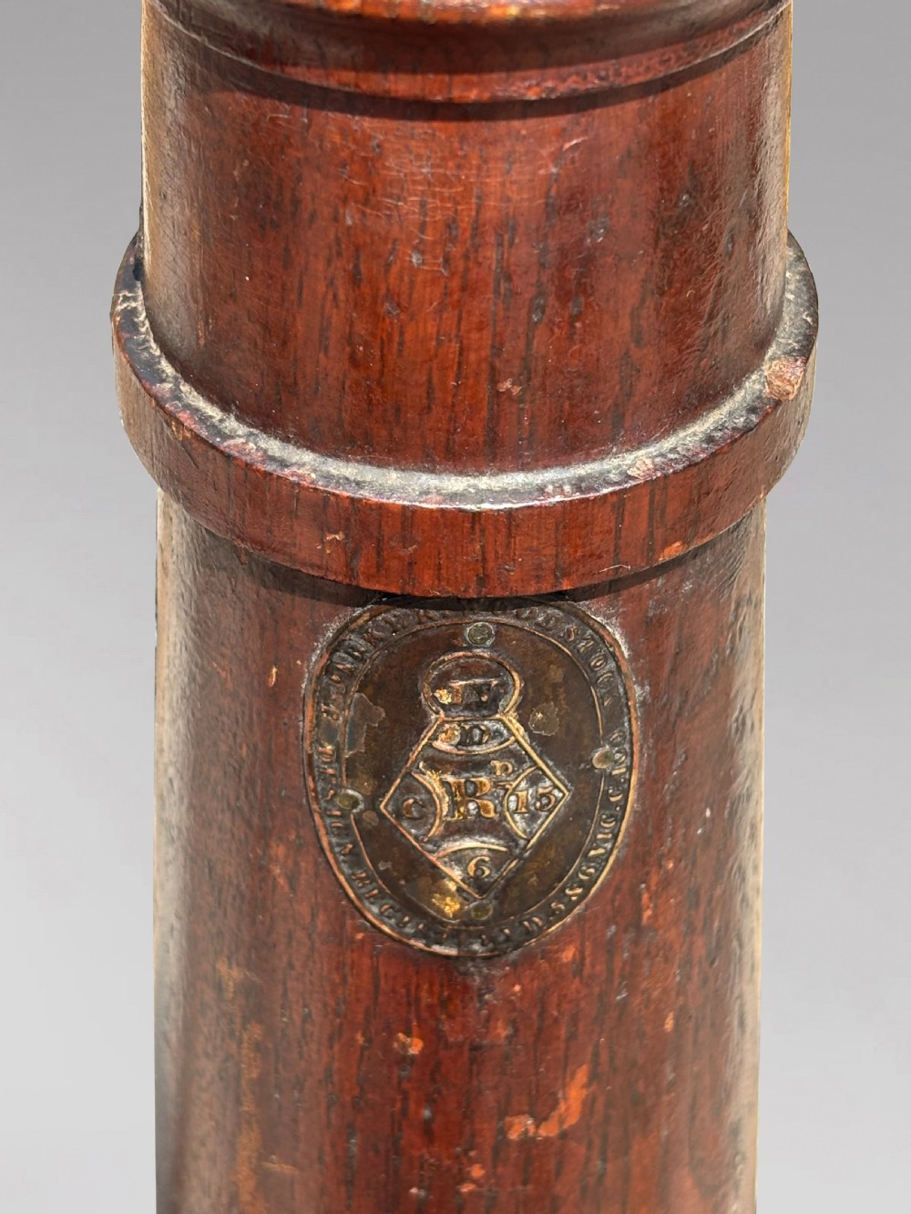 A Victorian freestanding coat stand crafted with a central barley-twist dark wood shaft surrounded by shed fallow deer antlers on a turned circular base. View VII