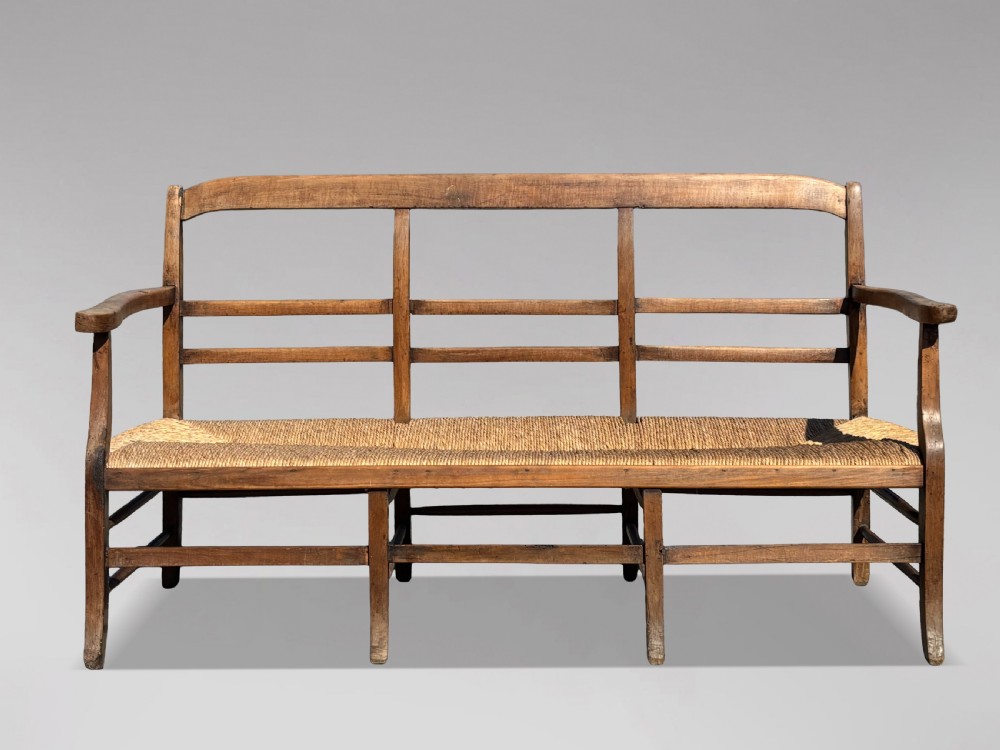 19TH CENTURY FRENCH WALNUT RUSH SEAT HALL BENCH, C1850 View II