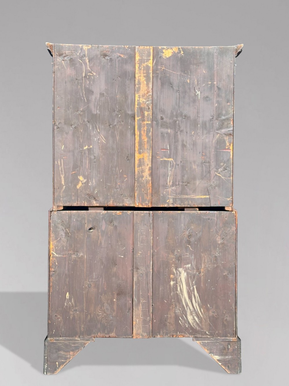 An 18th-century George III mahogany chest on chest featuring upper and lower drawer sections with brass handles and bracket feet. View VI