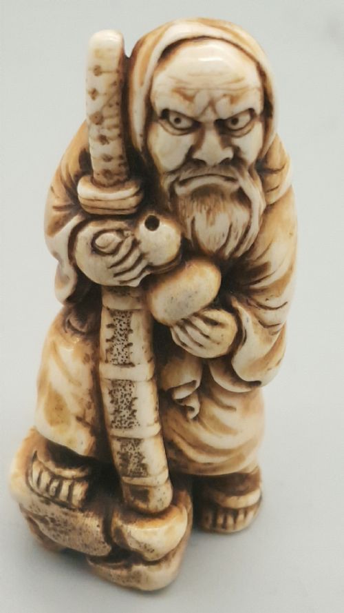 Japanese Edo Stag Antler Netsuke of a Yamabushi (Hermit), Signed