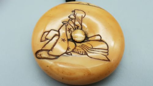 japanese meiji ivory manju netsuke of a woman wearing a cloth headscarf - CATEGORY: ANTIQUE MISCELLANEOUS - DATED 19TH CENTURY