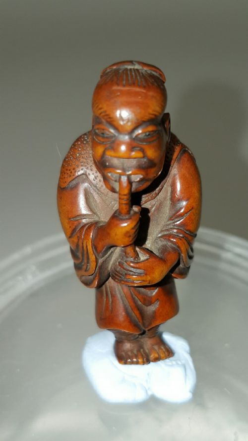 charming japanese meiji 19thc boxwood netsuke of a man playing a flute shakuhachi signed yoshihide - CATEGORY: ANTIQUE MISCELLANEOUS - DATED 19TH CENTURY