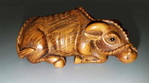 japanese meiji early 20thc boxwood netsuke of reclining ox - CATEGORY: ANTIQUE MISCELLANEOUS - DATED 1910