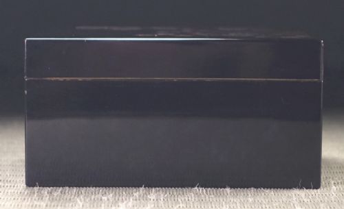 Rectangular black lacquer box decorated with gold and silver floral chrysanthemum motifs on the upper lid surface. View VIII