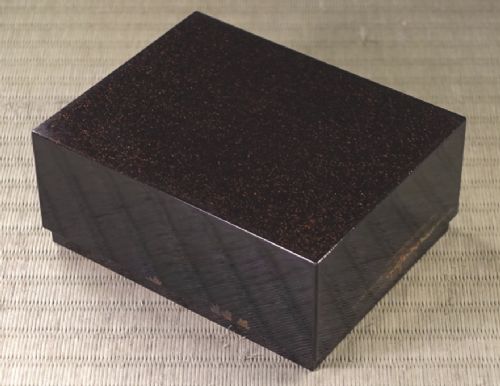 Rectangular black lacquer box decorated with gold and silver floral chrysanthemum motifs on the upper lid surface. View XI