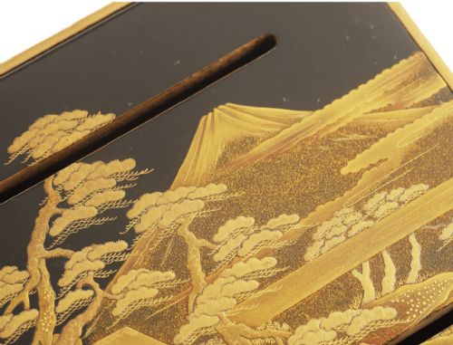 A Japanese black and gold lacquerware sake table featuring a raised stand, removable matching tray, and three red lacquer sakazuki cups adorned with painted gold motifs. View III