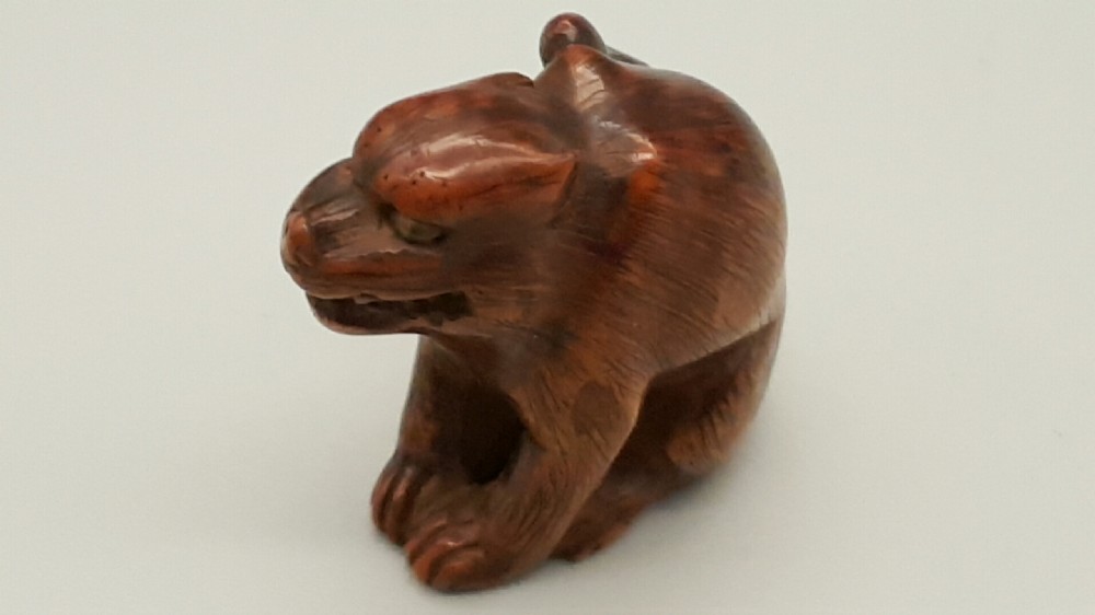 Japanese Edo (19thC) Boxwood Netsuke of a Tiger with Inlaid Eyes View II