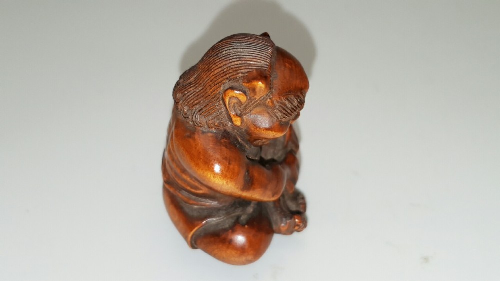 Good Meiji Boxwood Netsuke of an Oni  View IV