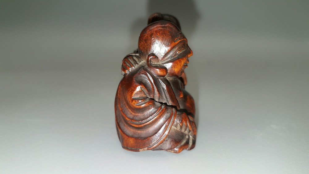 Japanese Meiji (19thC) Boxwood Netsuke of Hotei & Karako, Signed Minkoku View IV