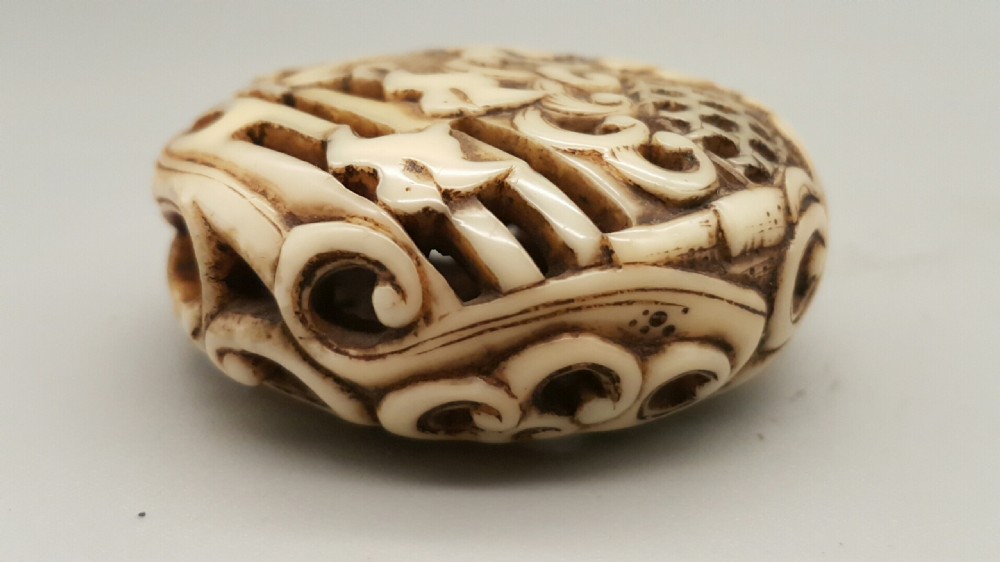 Japanese Edo Stag Antler Ryusa (Pierced) Manju Netsuke, the Asakusa School View VI
