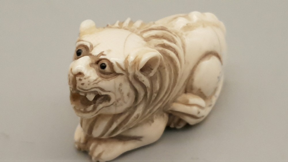 Japanese Meiji Ivory Netsuke of a Seated Lion 