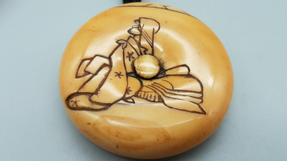 Japanese Meiji Ivory Manju Netsuke of a Woman Wearing a Cloth Head-Scarf