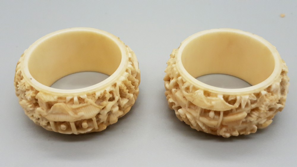 Outstanding pair of 19thC Chinese Ivory Carved Napkin Rings