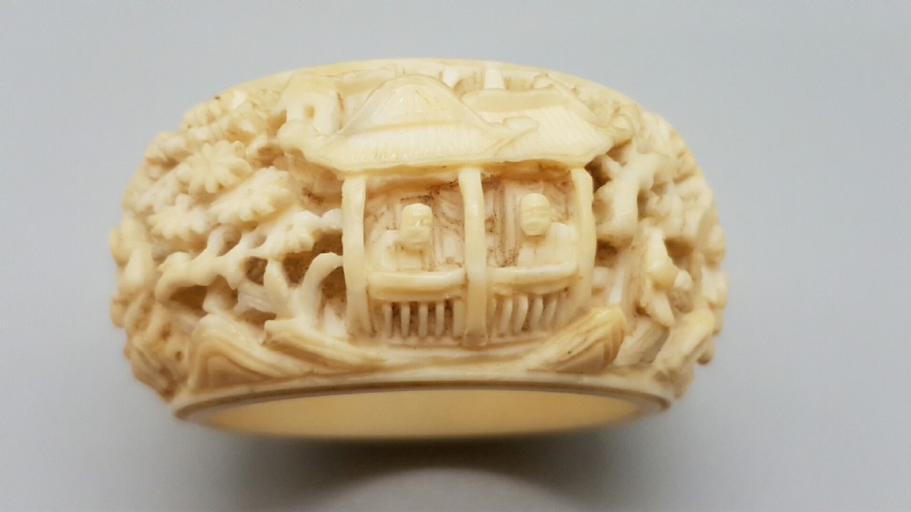 Outstanding pair of 19thC Chinese Ivory Carved Napkin Rings View II
