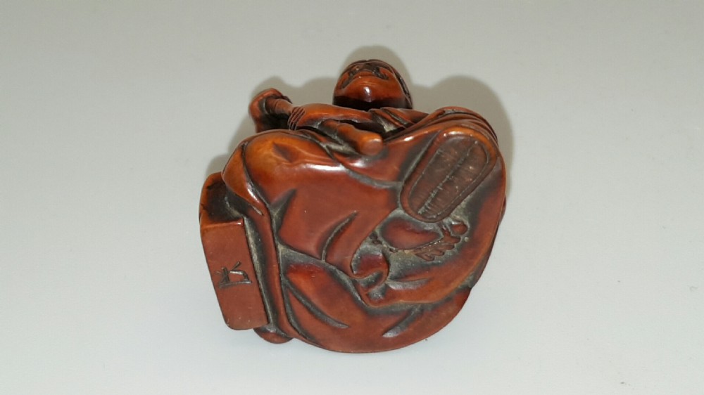 Japanese Meiji Boxwood Netsuke of Seated Figure with Staff View V