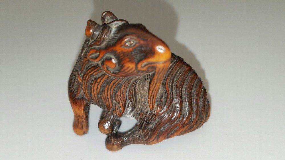 Japanese Edo (early 19thC) Boxwood Netsuke of a Goat signed Kokei