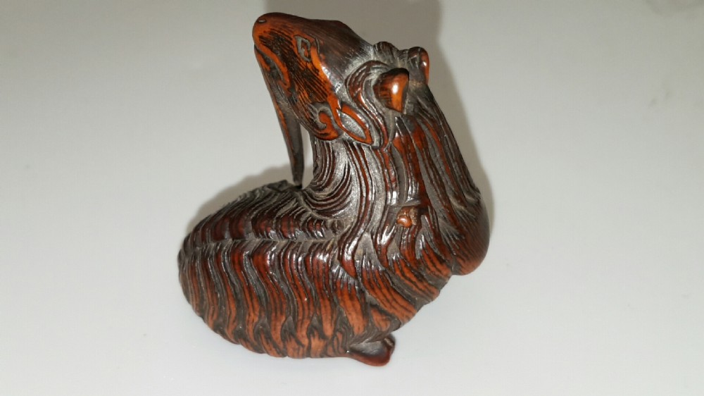 Japanese Edo (early 19thC) Boxwood Netsuke of a Goat signed Kokei View II