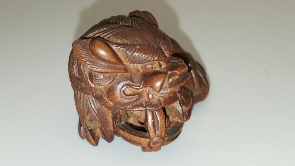 Japanese Meiji (19thC) Boxwood Netsuke of Shishi Guarding a Sacred Ball, signed Masayoshi View II