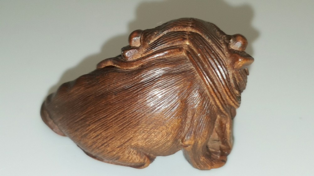 Japanese Meiji (19thC) Boxwood Netsuke of Shishi Guarding a Sacred Ball, signed Masayoshi View IV