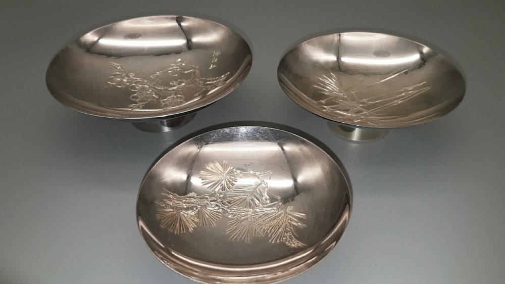 Japanese Meiji Set of Three Sterling Silver Sake Cups, signed Mitsukoshi View II