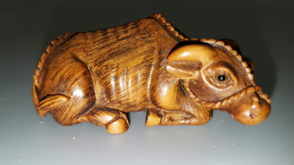 Japanese Meiji (early 20thC) Boxwood Netsuke of Reclining Ox 