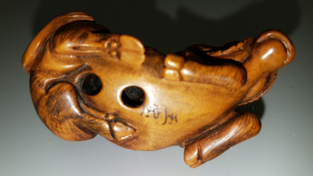 Japanese Meiji (early 20thC) Boxwood Netsuke of Reclining Ox  View IV