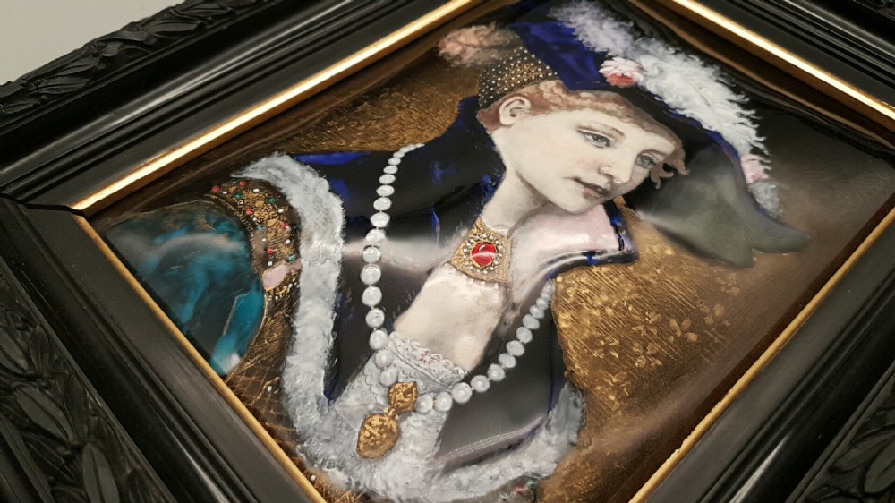 A 19th-century French Limoges enamel porcelain plaque featuring a portrait of a woman in Renaissance clothing, presented within a dark moulded frame. View IX