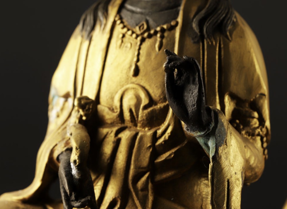A pair of late nineteenth-century Japanese gilt bronze statues depicting the Bodhisattvas Samantabhadra seated on an elephant and Manjushri seated on a lion. View V