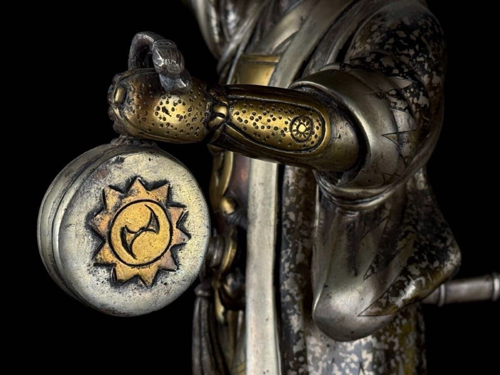 A late 19th-century Japanese bronze sculpture depicting samurai warrior Oishi Yoshio with gold and silver inlay detailing. View IX