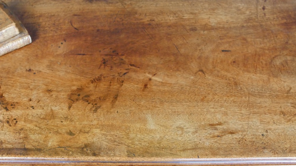 A nineteenth-century William IV mahogany fold-over tea table featuring reeded turned legs and a polished timber surface. View XII