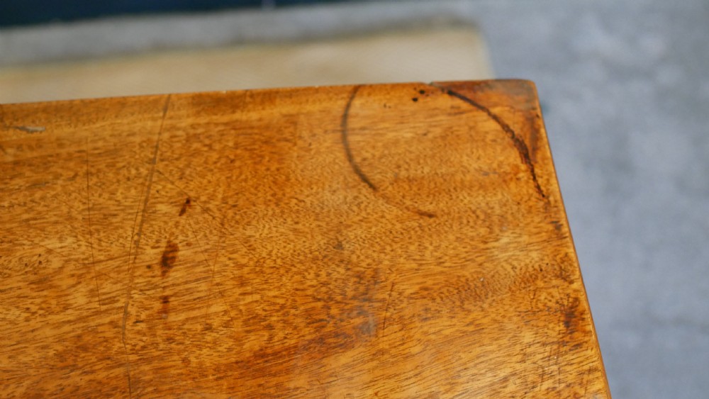 A nineteenth-century William IV mahogany fold-over tea table featuring reeded turned legs and a polished timber surface. View XV
