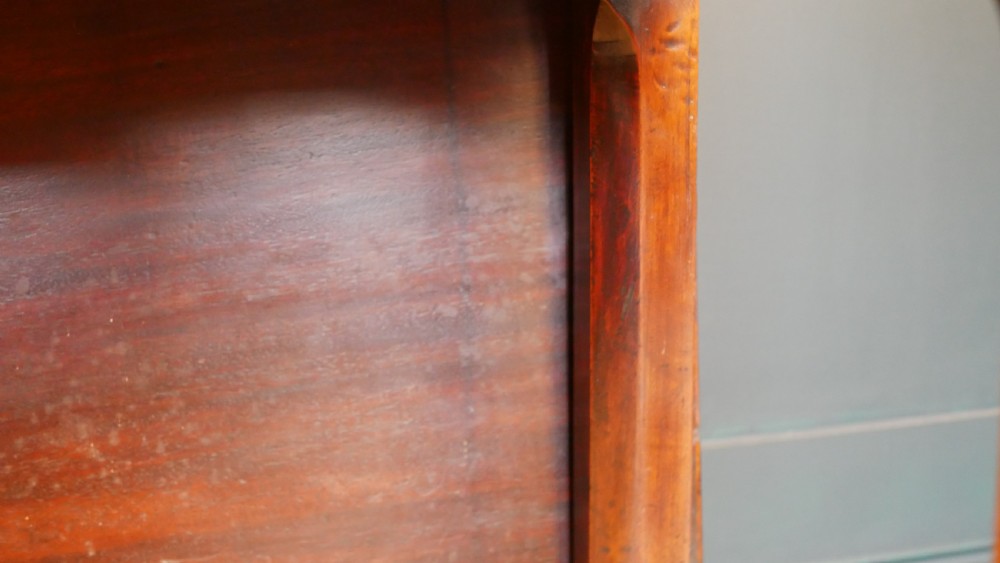A George IV mahogany console table with a single frieze drawer, brass swan-neck handles, key tassel, and straight square legs. View IX