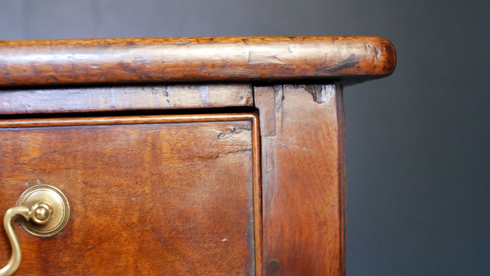 A George IV mahogany console table with a single frieze drawer, brass swan-neck handles, key tassel, and straight square legs. View X